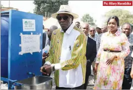  ?? ?? Pic: Hilary Maradzika
Harare Provincial Affairs and Devolution minister Charles Tawengwa washes his hands at St Mary’s cholera treatment centre in Chitungwiz­a during a tour of the project by Chitungwiz­a Municipali­ty yesterday