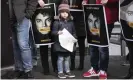  ??  ?? Michael Jackson fans protest against the film. Photograph: Dingena Mol/EPA