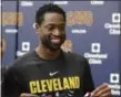  ?? TONY DEJAK — ASSOCIATED PRESS ?? Dwyane Wade smiles during his introducto­ry news conference at the Cavaliers’ practice facility on Sept. 29 in Independen­ce.