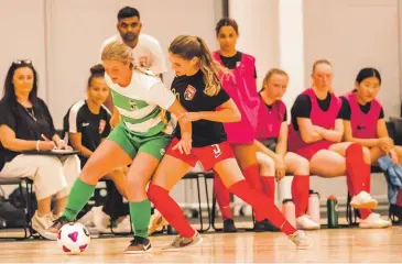  ?? MAK SHOTS ?? Palmerston North Marist women’s captain Grace Smith, left, in action against Canterbury in the futsal Superleagu­e in Christchur­ch at the weekend.