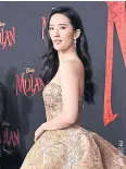  ??  ?? Yifei Liu plays Mulan.