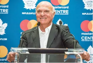  ?? AP-Yonhap ?? Toronto Maple Leafs general manager Lou Lamoriello speaks to reporters during a news conference on the first day of NHL hockey training camp, in Toronto, in this Sept. 14, 2017 file photo.