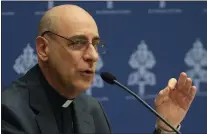  ?? GREGORIO BORGIA - THE ASSOCIATED PRESS ?? The prefect of the Vatican’s Dicastery for the Doctrine of the Faith, Cardinal Victor Manuel Fernandez, presents the declaratio­n “Dignitas Infinita’ (Infinite Dignity) during a press conference at the Vatican, Monday.