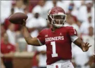  ?? SUE OGROCKI - THE ASSOCIATED PRESS ?? In this Saturday, Sept. 8, 2018, file photo, Oklahoma quarterbac­k Kyler Murray (1) throws during an NCAA college football game against UCLA, in Norman, Okla. Murray was named a Heisman Trophy finalist on Monday, Dec. 3, 2018.