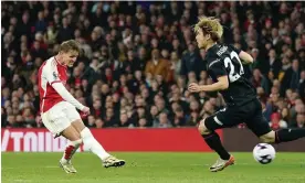  ?? ?? Martin Ødegaard drills Arsenal into the lead against Luton in the first half. Photograph: Nick Potts/PA