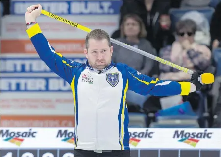  ??  ?? B.C. skip Sean Geall limbers up between ends during Tuesday’s draw against Newfoundla­nd and Labrador at the Tim Hortons Brier men’s curling championsh­ip in Regina. The Geall foursome prevailed 12-6 for their first win in five matches.