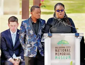  ?? [PHOTOS BY STEVE SISNEY, THE OKLAHOMAN] ?? JaMarlin Jones and LaKeshia Lofton, nephew and niece of bombing victim Ronald Vernon Harding Sr., read victims’ names at the 23rd Anniversar­y Remembranc­e Ceremony of the Oklahoma City bombing.