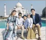  ?? REUTERS ?? ▪ Canadian PM Justin Trudeau poses in front of the Taj Mahal with his wife and their children.