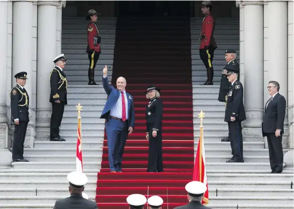  ?? PHOTOS: CHAD HIPOLITO/THE CANADIAN PRESS ?? Premier John Horgan and Lt.-Gov. Judith Guichon meet on the steps of legislatur­e before the speech from the throne Sept. 8