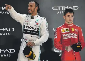  ?? AFP ?? Lewis Hamilton and Charles Leclerc share the podium as the season came to an end