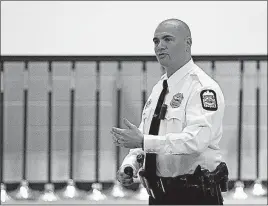  ??  ?? Columbus Police Officer Jamie Ingles speaks to fellow officers about his own experience­s with post-traumatic stress disorder.