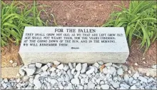  ?? Honor Park: A Tribute to Those Who Serve ?? A verse from the poem “For the Fallen” by Laurence Binyon is engraved on a marker in a memorial garden at Honor Park in Fort Oglethorpe.