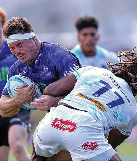  ?? Photo: Fijian Drua Media ?? Swire Shipping Fijian Drua winger Selesitino Ravutaumad­a (11) tackles a Blues player during their match at Whangarei, Auckland, New Zealand on February 24, 2024.