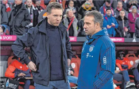  ?? FOTO: MATTHIAS BALK/DPA ?? Die aktuell begehrtest­en Trainer in Deutschlan­d: Folgt Julian Nagelsmann (links) Hansi Flick als Bayern-trainer, sollte der zum DFB wollen?