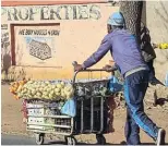  ?? ?? MOBILE VEGETABLE STALL: A vegetable vendor takes his produce to his customers who have become reliant on the service since lockdown created a need for it.