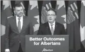  ?? Screen capture ?? Dale Nally, Minister of Service Alberta and Red Tape Reduction makes announceme­nt last week at a news conference with Brian Jean, Minister of Jobs, Economy and Northern Developmen­t looking on.