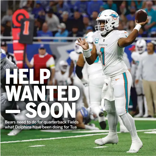  ?? LEON HALIP/GETTY IMAGES ?? Quarterbac­k Tua Tagovailoa has the highest passer rating in the league, but the Dolphins have given him a lot of assistance to get there.