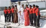  ?? — PTI ?? Defence minister Nirmala Seetharama­n with Navy chief Admiral Sunil Lanba greet the all- women crew of INSV Tarini at Panaji in Goa on Monday.