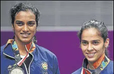  ?? GETTY ?? PV Sindhu and Saina Nehwal were bought for ~80 lakh each.