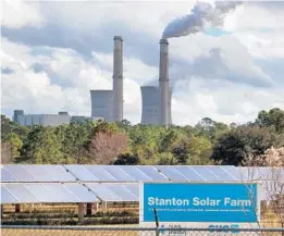  ?? JOE BURBANK/ORLANDO SENTINEL ?? The cooling towers of the Curtis H. Stanton Energy Center, as seen from the Stanton Solar Farm on Dec. 14.