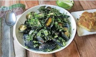  ?? [PHOTO MOULTON, AP] ?? These steamed mussels with Thai flavoring are from a recipe by chef Sara Moulton.