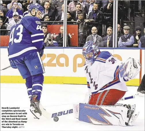  ?? GETTY ?? Henrik Lundqvist completes spectacula­r performanc­e in net with stop on Nazem Kadri in the third and final round of the shootout as Rangers win in Toronto on Thursday night.