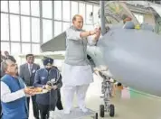  ??  ?? Defence minister Rajnath Singh performing a puja upon receiving the first Rafale jet from French aircraft manufactur­er Dassault Aviation in Merignac in France on Thursday. REUTERS