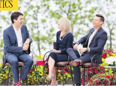  ?? AARON LYNETT / THE CANADIAN PRESS ?? Prime Minister Justin Trudeau speaks with Kelly Ripa and Ryan Seacrest on Live with Kelly and Ryan in Niagara Falls, Ont., on Monday.