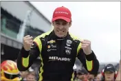  ?? DARRON CUMMINGS — THE ASSOCIATED PRESS FILE ?? Simon Pagenaud, of France, celebrates after winning the Indy GP IndyCar auto race at Indianapol­is Motor Speedway in Indianapol­is on May 11, 2019.