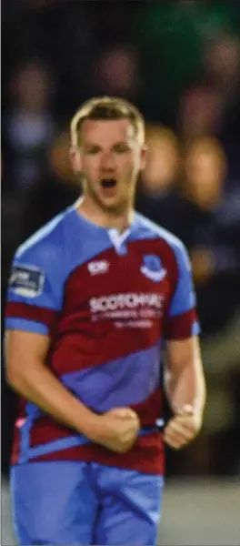  ??  ?? Joy and despair - Drogheda United’s Luke Gallagher shakes a fist at the final whistle as Gary Shaw of Shamrock Rovers reflects on his team’s shock defeat.