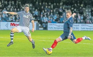  ?? ?? Dumbarton’s Gregg Wylde scores his side’s second goal at Elgin