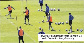  ??  ?? Players of Bundesliga team Schalke 04 train in Gelsenkirc­hen, Germany