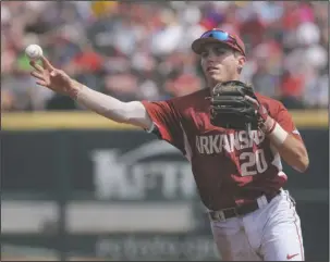  ?? NWA Democrat-Gazette/BEN GOFF ?? READY FOR BEAR HUNT: Arkansas second baseman Carson Shaddy throws to first for an out after fielding a ground ball against LSU Sunday at Baum Stadium in Fayettevil­le. The Hogs are in Springfiel­d, Mo., to face the Missouri State Bears before hosting...