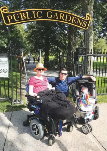  ?? MIKE SAMPSON VIA CP ?? Lindsey Hubley (left), her fiance Mike Sampson and their son Myles are shown at the entrance to the Public Gardens in Halifax. Hubley, a new mother who was diagnosed with flesh-eating disease days after giving birth and is now a quadruple amputee, is...