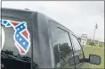  ?? DAVID GOLDMAN — AP ?? A pickup truck with a Confederat­e flag-themed decal is parked outside the Reception and Medical Center, the state’s prison hospital, in Lake Butler, Fla., earlier this year.