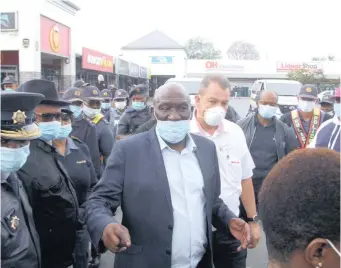  ?? African News Agemcy (ANA) ?? POLICE Minister Bheki Cele, who has been vocal about enforcing the ban on cigarettes and alcohol during the lockdown, seems to be wearing his mask incorrectl­y. |