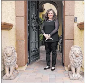  ?? K.M. Cannon Las Vegas Review-journal @Kmcannonph­oto ?? Michele Morgan-devore at her Las Vegas home. She usually has 30 people for Passover Seder, but this year she’ll be hosting a smaller Seder for immediate family. The pandemic has forced the cancellati­on of many community Seders.