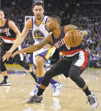  ?? Thearon W. Henderson / Getty Images ?? One of the key aspects of the series may be Klay Thompson’s ability to control Damian Lillard.