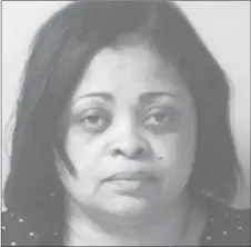  ??  ?? Janet Rogers, board president of Harvey School District 152, was convicted of felony theft and state benefits fraud in 2004 and sentenced to 180 days in jail.