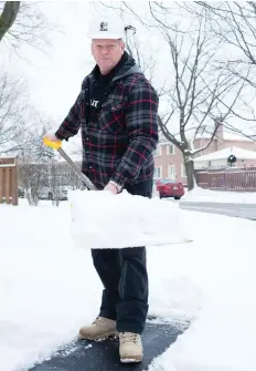  ?? ALEX SCHULDTZ/THE HOLMES GROUP ?? When clearing sidewalks and driveways of snow, take care not to pile it up near your home’s foundation.