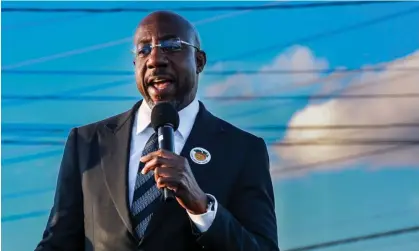  ?? Photograph: Justin Kase Photograph­y/Rex/Shuttersto­ck ?? Raphael Warnock campaigns in Decatur, Georgia, on Sunday.