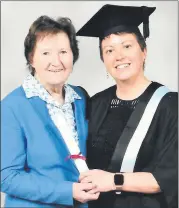  ?? ?? Patricia Devine, who recently graduated from Trinity College, Dublin, celebratin­g with her mother, Eileen Ahern, Araglin.