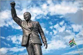  ?? Photo: Finbarr O’Reilly /Reuters ?? Icon: Nelson Mandela has his critics, but delivered the best Constituti­on in the world, writes Bheki Makhubu.