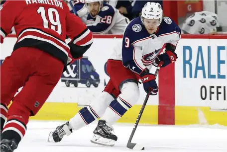  ?? ASSOCIATED PRESS ?? SLICK MOVES: The Blue Jackets' Artemi Panarin brings the puck up the ice against the Carolina Hurricanes earlier this season. The Columbus star is on the trade market, but might cost too much for the Bruins.