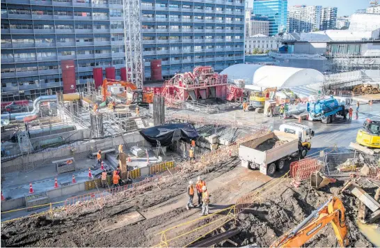  ?? Photo / Michael Craig ?? Right, An artist’s impression of the proposed Aotea Central developmen­t above the Aotea Station, at the corner of Mayoral Drive and Wellesley St in central Auckland. Left, the Aotea Station constructi­on site.