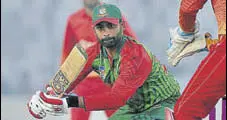  ?? AFP ?? Bangladesh opener Tamim Iqbal scored 84 off 93 balls.
