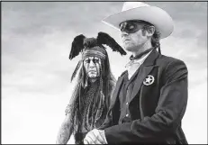  ?? ENTERPRISE­S, INC., PETER MOUNTAIN / ASSOCIATED PRESS ?? Johnny Depp as Tonto (left) and Armie Hammer as The Lone Ranger, in a scene from “The Lone Ranger.”