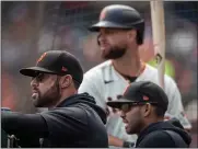  ?? KARL MONDON — BAY AREA NEWS GROUP ?? San Francisco Giants manager Gabe Kapler watches the game against the San Diego Padres as Brandon Belt waits for his next at-bat at Oracle Park in San Francisco.