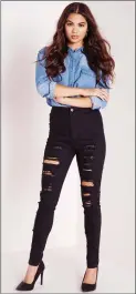  ??  ?? Denim shirt with ripped jeans.