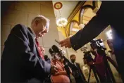  ?? MARK MIRKO — HARTFORD COURANT VIA AP ?? State Senate President Pro Tempore Martin Looney meets with reporters outside the Senate chamber on June 9, in Hartford, Conn.